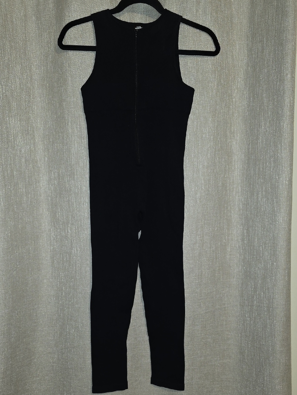 Sleek Black Sleeveless Jumpsuit with High Neck